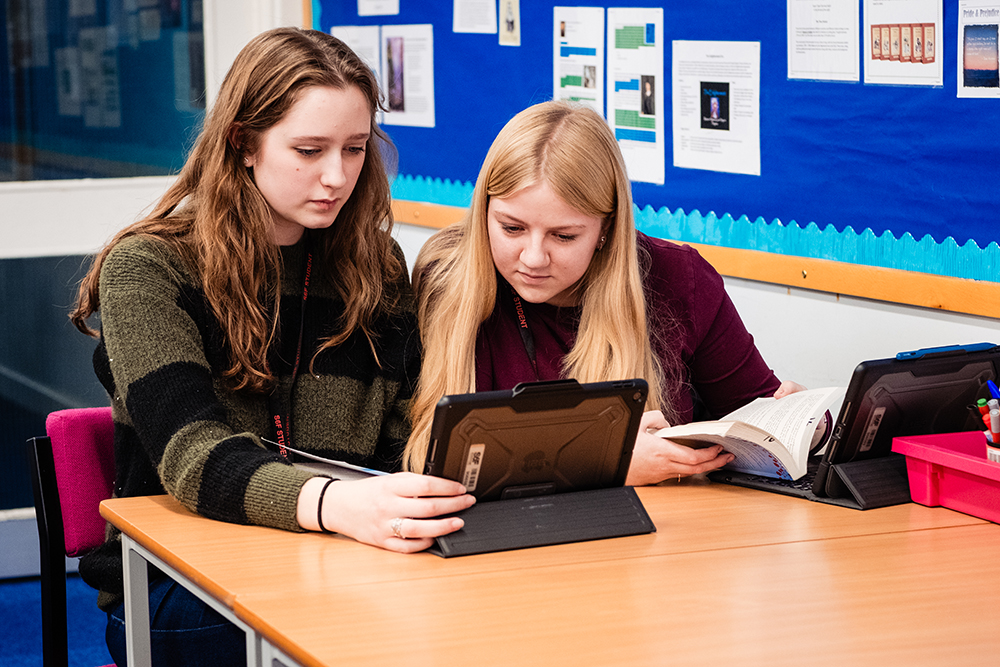 Students using iPads in an English Literature lesson